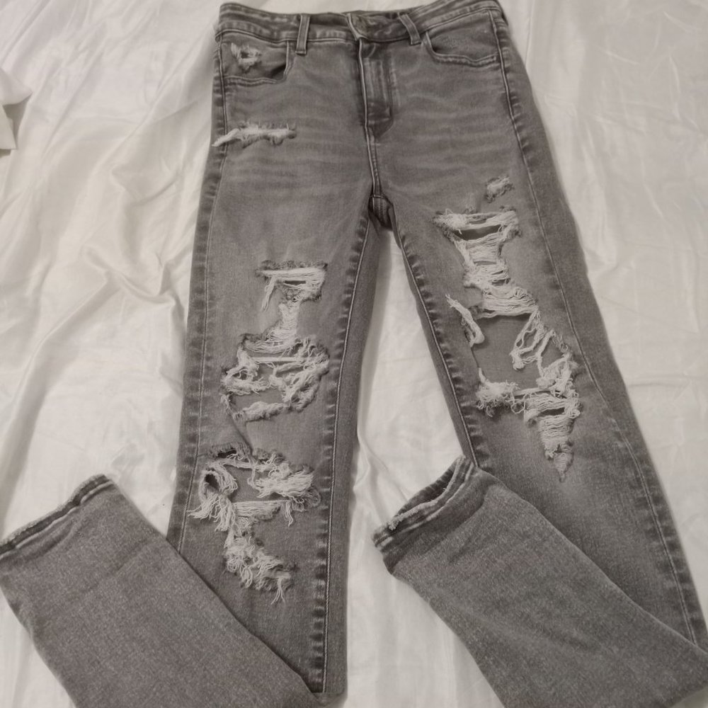 Black distressed AE jeggings